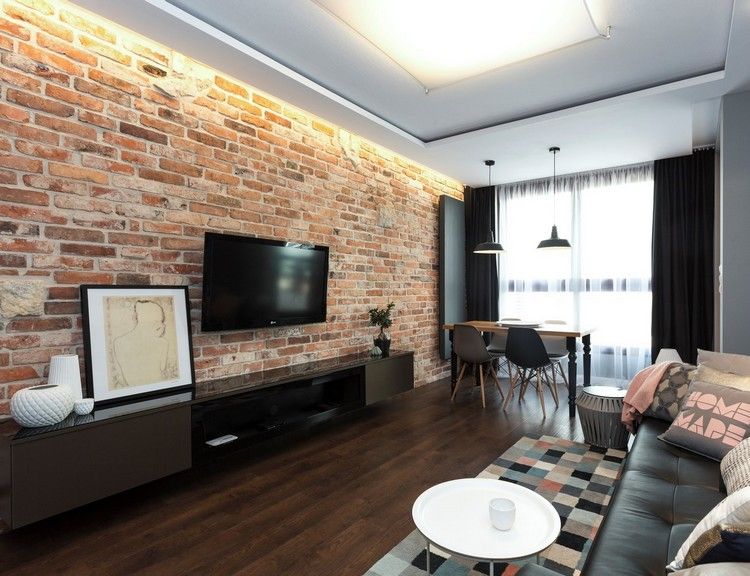 Stue tendenser 2016 industriel-chic-mursten-væg-sort-lowboard-væg-tv-indirekte-belysning